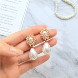 S925银针韩国椭圆珍珠品法式复古气质精致轻奢小众高级设计感耳钉耳饰
