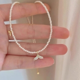 小众鱼尾珍珠吊坠项链女简约高级感2026新款爆款锁骨链小米珠颈链